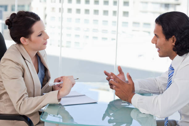 istock Young business people negotiating 824227246