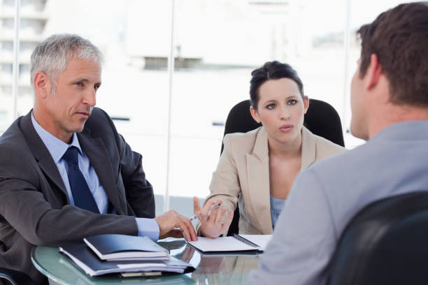 istock Business team negotiating with a customer 824227522