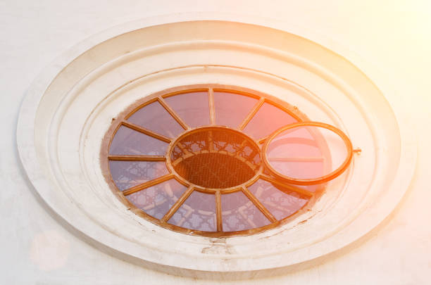 Round Glass Window at Old Building Exterior