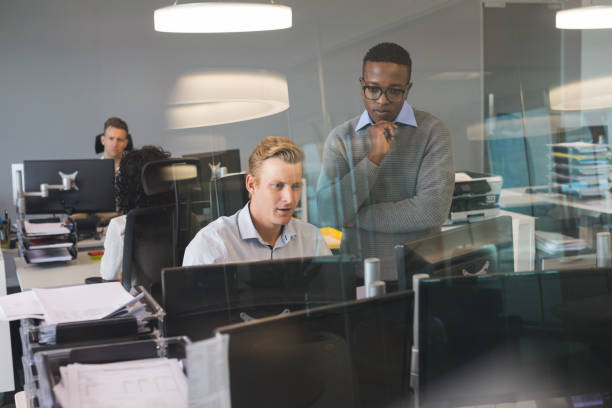 istock Focused business colleagues working at desk 824238600