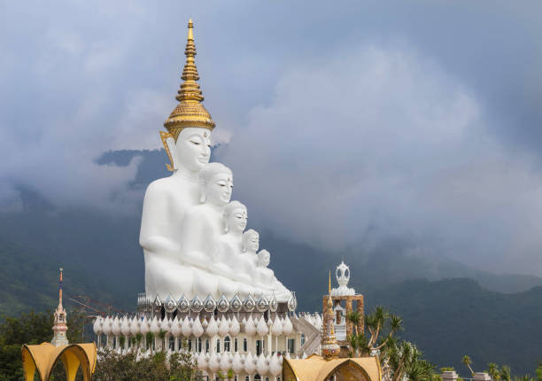 istock big white buddha statues sitting on rainy day. 824241430