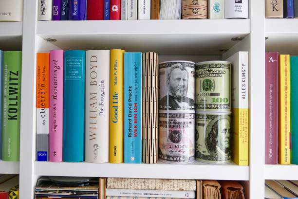 istock Filled book shelves with books, old vinyls, compact discs and cassettes 824242380