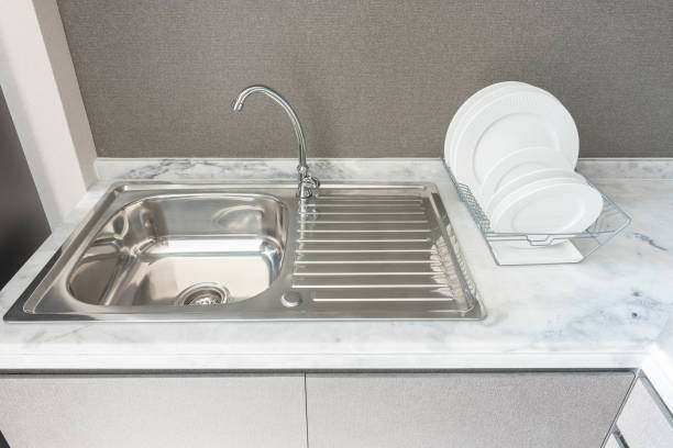 istock modern kitchen room with sink on granite counter top 824246770