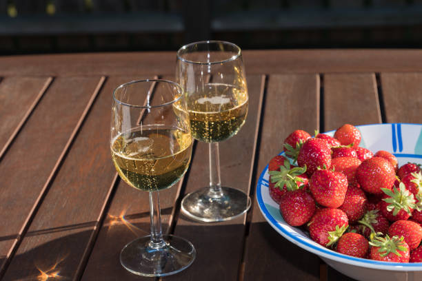 istock Fresh strawberries and sparkling wine 824247120