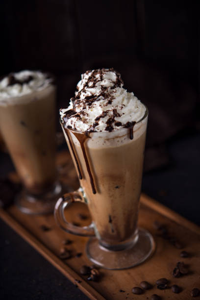 istock Iced coffee on wooden background 824254702