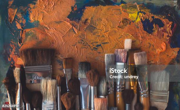 Top View Picture Of Wooden Paintbrush Set Different Size With Old Palette On The Background Stock Photo - Download Image Now