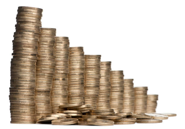 istock Stacks of 1 Euros Coins in front of white background 824257730