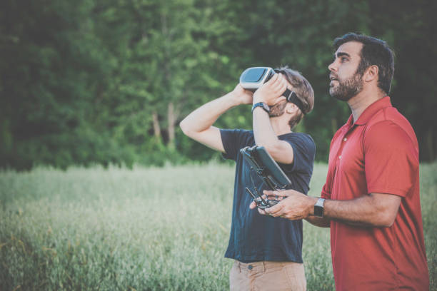 istock Friends Using Drone and Virtual Reality Headset Outdoor 824260504