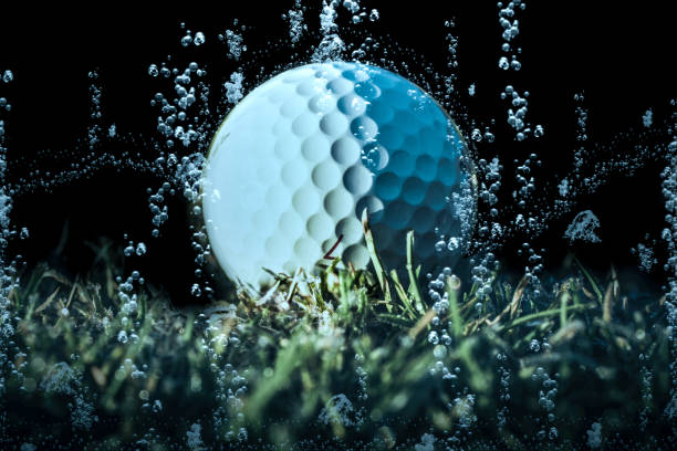 white golfball - dimple stock-fotos und bilder