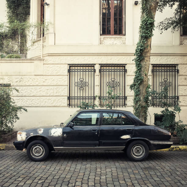 istock Old car parked in the street 824261984