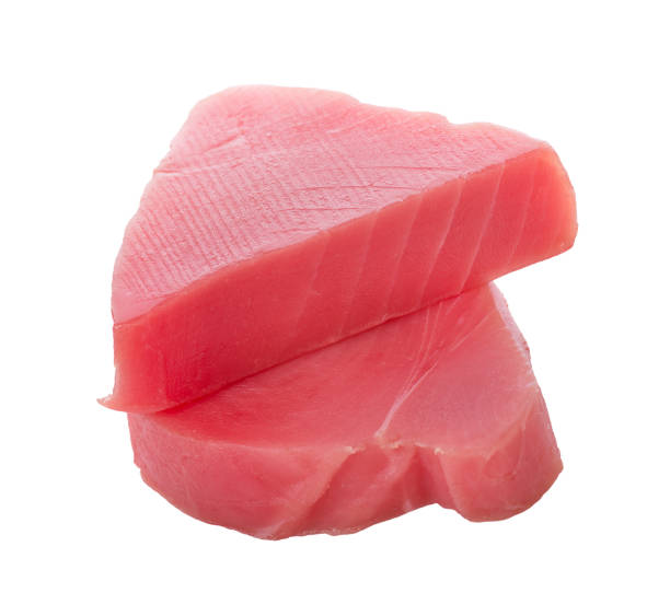 istock Raw  tuna steaks isolated on a white background 824262484