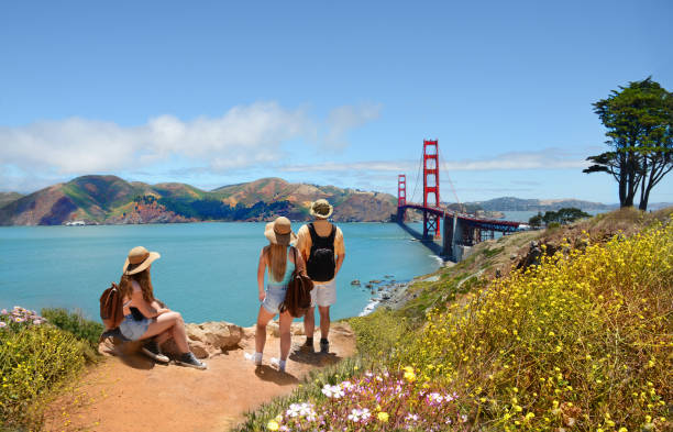 istock Family looking at beautiful summer mountains landscape. 824277634