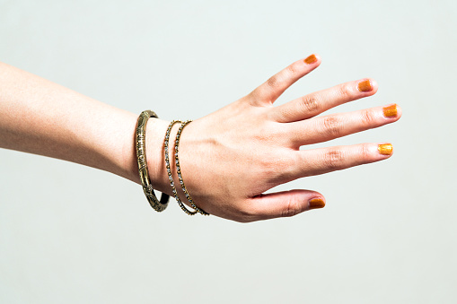 Woman with a bracelet.