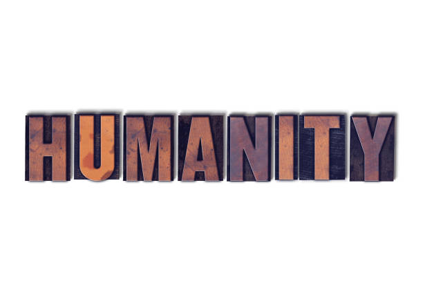 The word Humanity concept and theme written in vintage wooden letterpress type on a white background.