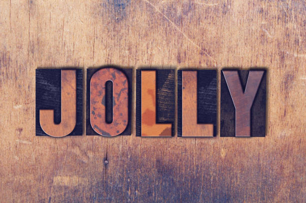 istock Jolly Theme Letterpress Word on Wood Background 824293860