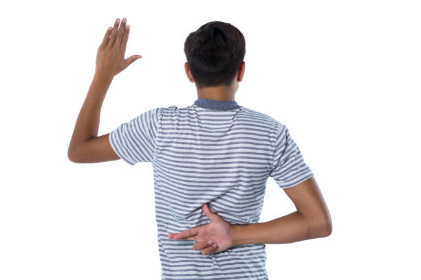 istock Teenage boy raising her hand 824294024