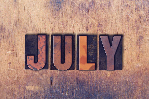 istock July Theme Letterpress Word on Wood Background 824294202