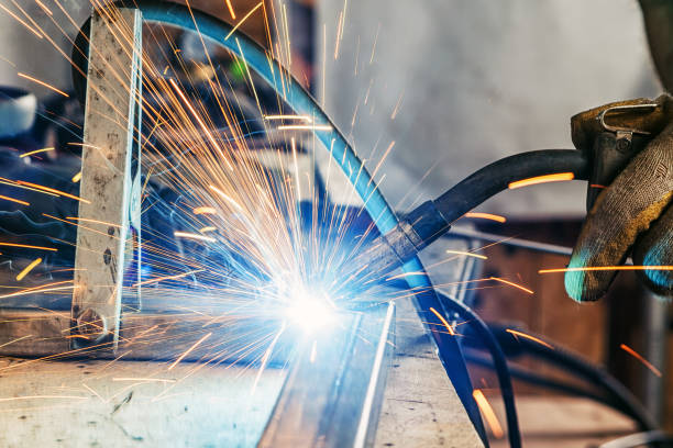 istock Close up man brews a metal 824298348
