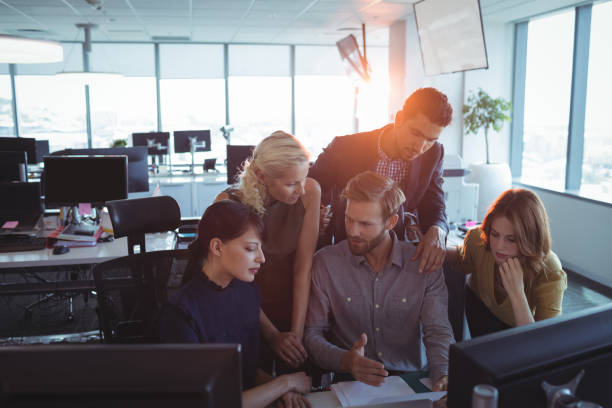 istock Business colleagues discussing together in office 824312172