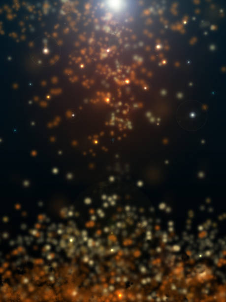 Glitter bokeh abstract background in yellow and orange color
