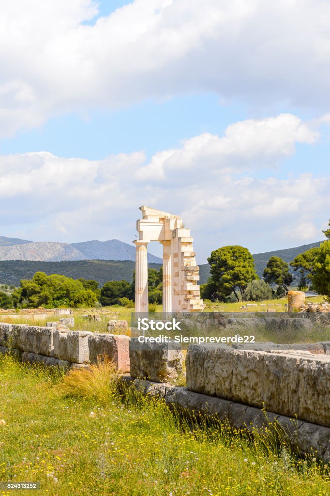 Ruins of Asklepieion, the Greek god of medicine, Epidaurus, Peloponnese, Greece. Sanctuary of Asclepius at Epidaurus.  UNESCO World Heritage Adventure Stock Photo