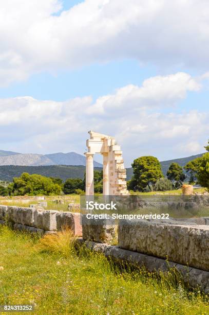 Ruins Of Asklepieion The Greek God Of Medicine Epidaurus Peloponnese Greece Sanctuary Of Asclepius At Epidaurus Unesco World Heritage Stock Photo - Download Image Now