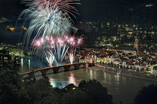 Heidelberg, Germany - May 21, 2013: Fireworks at Karl Theodor Bridge. Heidelberg Castle Lighting and Fireworks is annual event to commemorate the burning of the castle by the French troops in 1693.