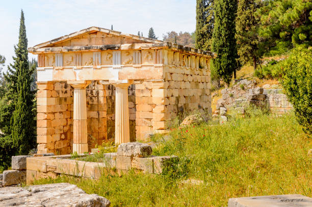 istock Athenian Treasury in Delphi, an archaeological site in Greece, at the Mount Parnassus. Delphi is famous by the oracle at the sanctuary dedicated to Apollo. UNESCO World heritage 824319622