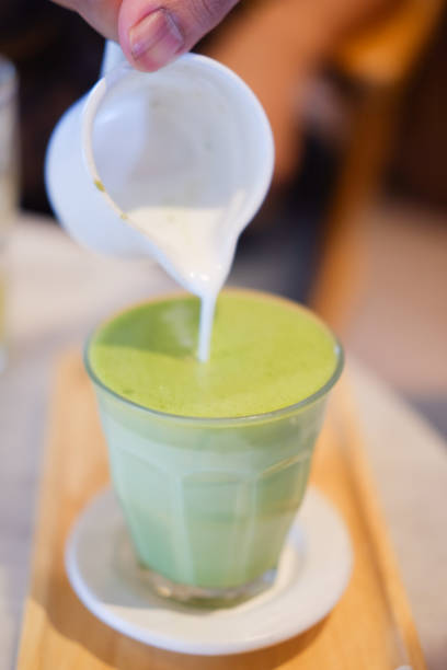 istock Hot premium organic japan matcha tea on wooden table ready 824319636