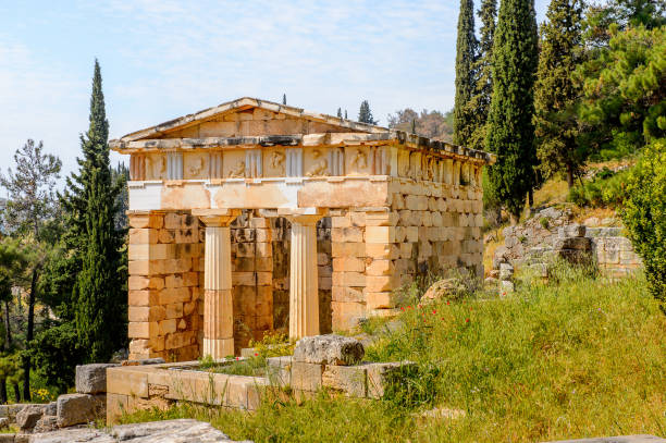 istock Athenian Treasury in Delphi, an archaeological site in Greece, at the Mount Parnassus. Delphi is famous by the oracle at the sanctuary dedicated to Apollo. UNESCO World heritage 824319962