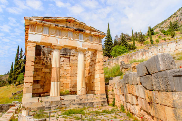 istock Athenian Treasury in Delphi, an archaeological site in Greece, at the Mount Parnassus. Delphi is famous by the oracle at the sanctuary dedicated to Apollo. UNESCO World heritage 824319974