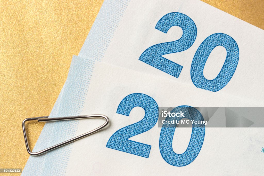 Directly above: Money and clip Currency, Paper Currency, Number 20, Cut Out, Pound Symbol Business Stock Photo