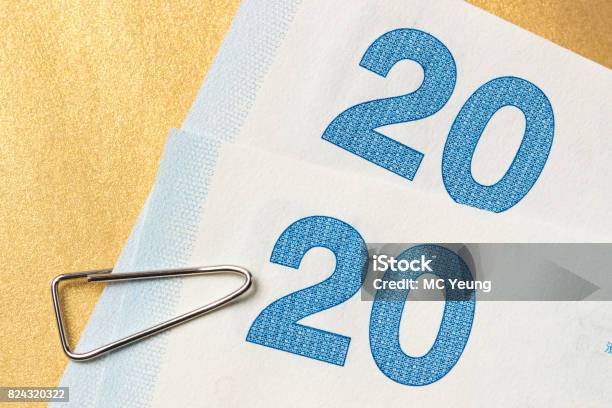 Directly Above Money And Clip Stock Photo - Download Image Now - Business, Business Finance and Industry, Care