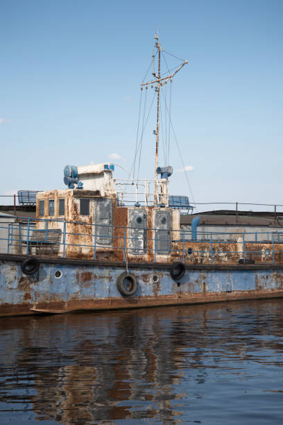 istock An old rusty ship in the pier on the Volga river. 824320720