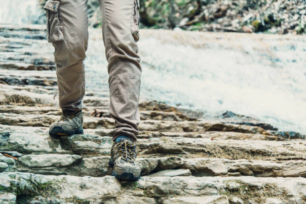 istock Traveler goes down the rocky mountain. 824323628