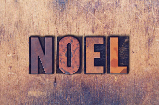 istock Noel Theme Letterpress Word on Wood Background 824324490