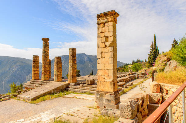 istock Apollo Temple in Delphi, an archaeological site in Greece, at the Mount Parnassus. Delphi is famous by the oracle at the sanctuary dedicated to Apollo. UNESCO World heritage 824324950