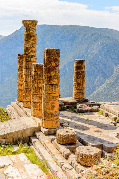 istock Apollo Temple in Delphi, an archaeological site in Greece, at the Mount Parnassus. Delphi is famous by the oracle at the sanctuary dedicated to Apollo. UNESCO World heritage 824325032