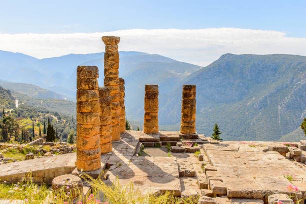 istock Apollo Temple in Delphi, an archaeological site in Greece, at the Mount Parnassus. Delphi is famous by the oracle at the sanctuary dedicated to Apollo. UNESCO World heritage 824325048