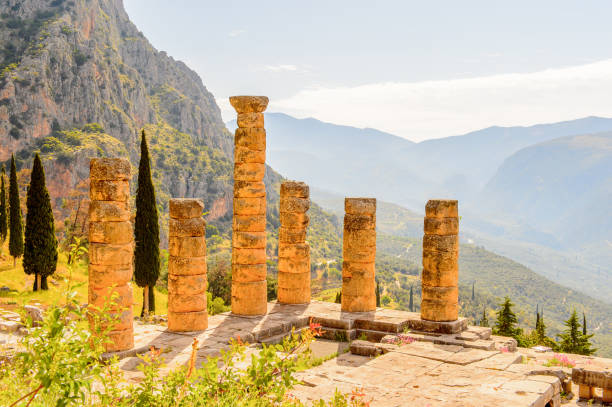 istock Apollo Temple in Delphi, an archaeological site in Greece, at the Mount Parnassus. Delphi is famous by the oracle at the sanctuary dedicated to Apollo. UNESCO World heritage 824325180