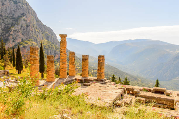istock Apollo Temple in Delphi, an archaeological site in Greece, at the Mount Parnassus. Delphi is famous by the oracle at the sanctuary dedicated to Apollo. UNESCO World heritage 824325194