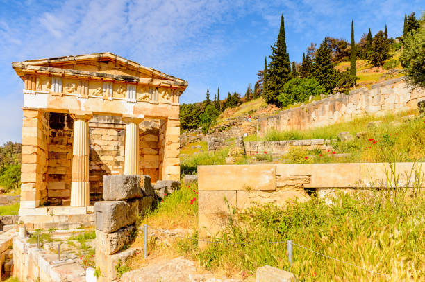 istock Athenian Treasury in Delphi, an archaeological site in Greece, at the Mount Parnassus. Delphi is famous by the oracle at the sanctuary dedicated to Apollo. UNESCO World heritage 824327350