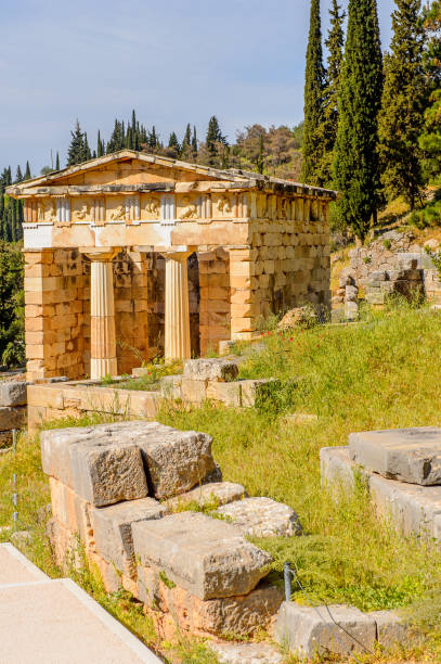 istock Athenian Treasury in Delphi, an archaeological site in Greece, at the Mount Parnassus. Delphi is famous by the oracle at the sanctuary dedicated to Apollo. UNESCO World heritage 824327370