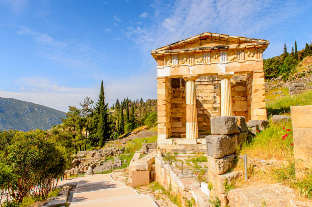 istock Athenian Treasury in Delphi, an archaeological site in Greece, at the Mount Parnassus. Delphi is famous by the oracle at the sanctuary dedicated to Apollo. UNESCO World heritage 824327544