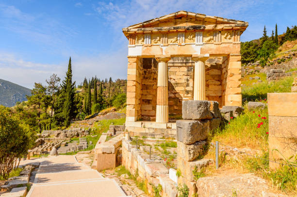 istock Athenian Treasury in Delphi, an archaeological site in Greece, at the Mount Parnassus. Delphi is famous by the oracle at the sanctuary dedicated to Apollo. UNESCO World heritage 824327564