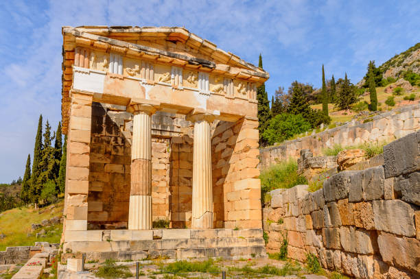 istock Athenian Treasury in Delphi, an archaeological site in Greece, at the Mount Parnassus. Delphi is famous by the oracle at the sanctuary dedicated to Apollo. UNESCO World heritage 824327734