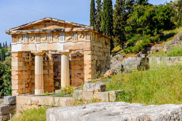 istock Athenian Treasury in Delphi, an archaeological site in Greece, at the Mount Parnassus. Delphi is famous by the oracle at the sanctuary dedicated to Apollo. UNESCO World heritage 824327832