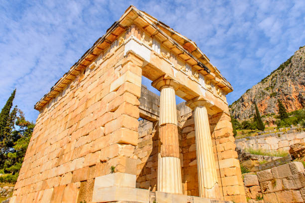 istock Athenian Treasury in Delphi, an archaeological site in Greece, at the Mount Parnassus. Delphi is famous by the oracle at the sanctuary dedicated to Apollo. UNESCO World heritage 824328140