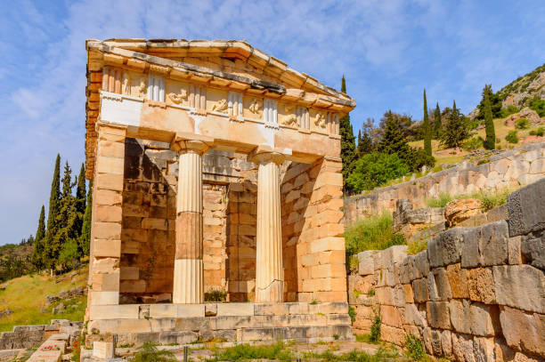 istock Athenian Treasury in Delphi, an archaeological site in Greece, at the Mount Parnassus. Delphi is famous by the oracle at the sanctuary dedicated to Apollo. UNESCO World heritage 824328172