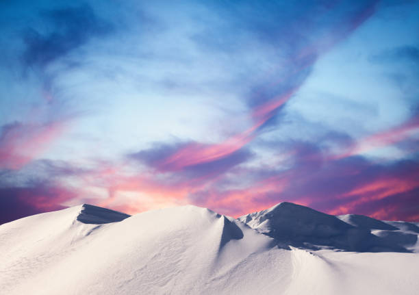 Winter Sunset In The Mountains Snowcapped mountains at sunset. polar climate photos stock pictures, royalty-free photos & images